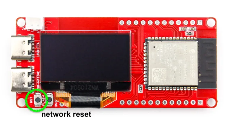 MaUWB ESP32-S3 module seen from above: the RST button, bottom left next to the OLED, is the network reset